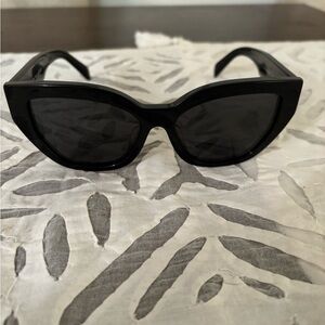 Sunglasses with Prada logo women